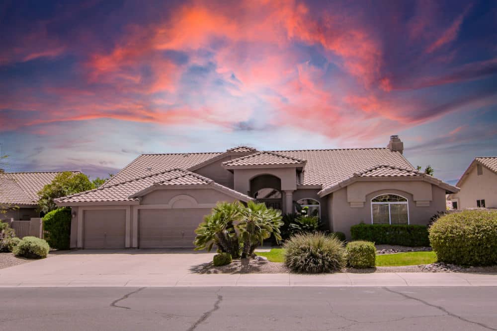 Pheonix Arizona Home with a tile roof in Pink and Purple Sunset