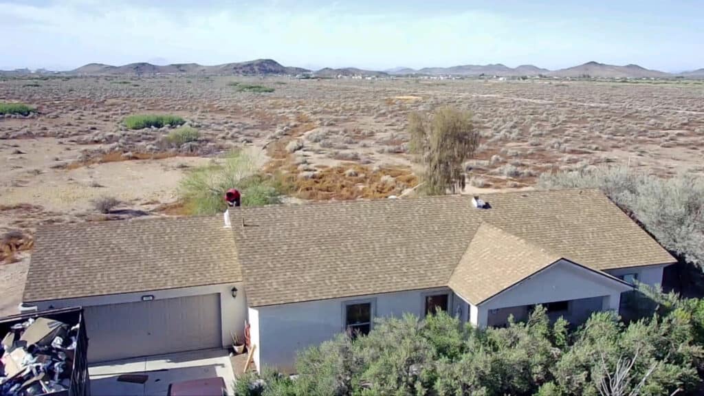 stapleton roofing performing a residential shingle roof repair